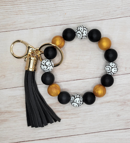 A7 Smiley Face Silicone Wristlet Keychain w/ Tassel